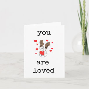 Eres querido, perro lindo con tarjeta cardíaca