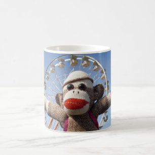 Ernie la taza de la noria del mono del calcetín