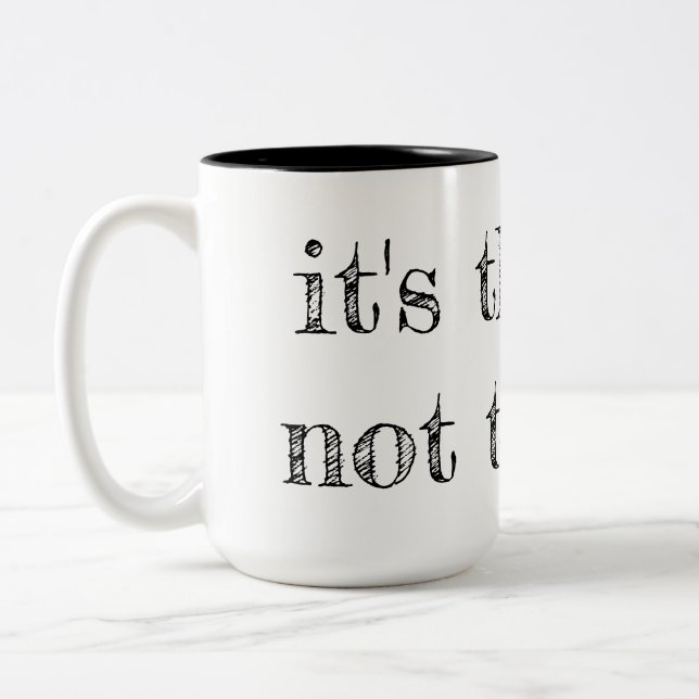Es taza del profesor del teatro del teatro no (Izquierda)