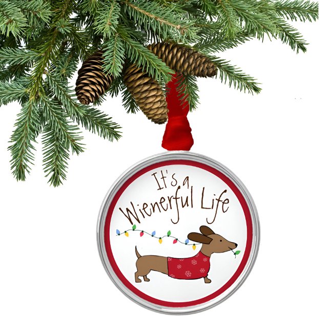 Es un adorno de árbol de navidad de doxie (dachshund wienerful life Christmas tree ornament. )