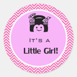 Es un chica pegatina de chevron rosado.