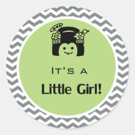 Es un chica pegatina de chevron verde y gris.