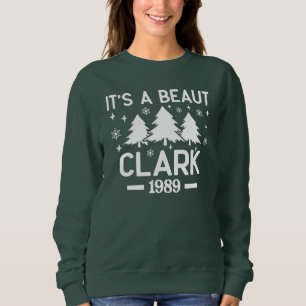 Es una belleza Clark Sudadera