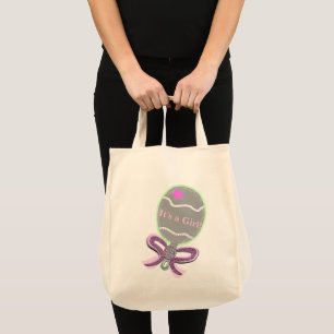 Es una bolsa de tote para bebé rosado Chica