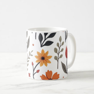 Es una taza decorada con flores y hojas.