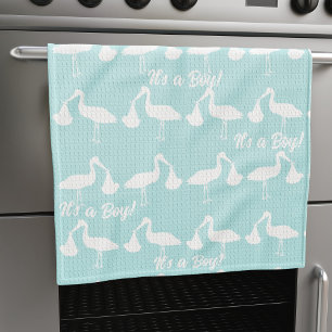 Es una toalla de cocina de cigüeñas de Baby Shower