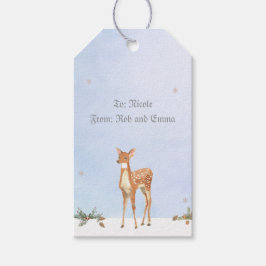 Escena de invierno con etiqueta de regalo de cierv