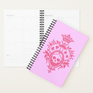 Escudo rosa con planificador de cráneo y trajes de