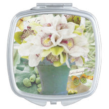 Espejo compacto con diseño orquídeo