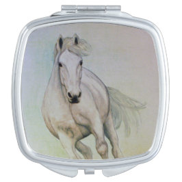 Espejo compacto de caballos blancos