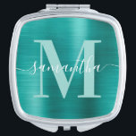 Espejo Compacto Monograma de firma Verde azulada de Aqua metálico<br><div class="desc">Crea tu propio nombre giratorio personalizado y espejo compacto monogramado para una dama de honor. El verde azulado gráfico de arte digital de Relieve metalizado metálico falso acuático se imprimirá como una foto. Se puede personalizar el monograma contemporáneo verde y blanco verde azulado pálido con un diseño caligráfico elegante de...</div>