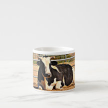 Taza enorme de la vaca del café