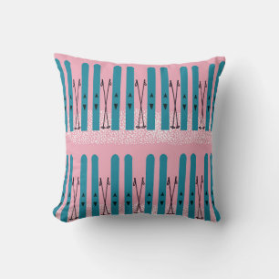 Esquí azul sobre almohada de tiro rosa