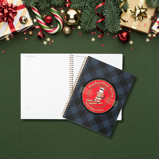 Esquí en pendiente perfecta con planificador de Sa (A Purrfect-Slope Skiing with Santa Claws Planner.)