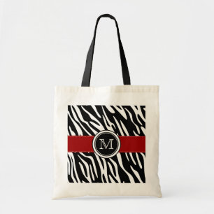 Estampado de zebra del monograma con la bolsa de