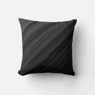 Este es un cojín de almohada para rayas negras.