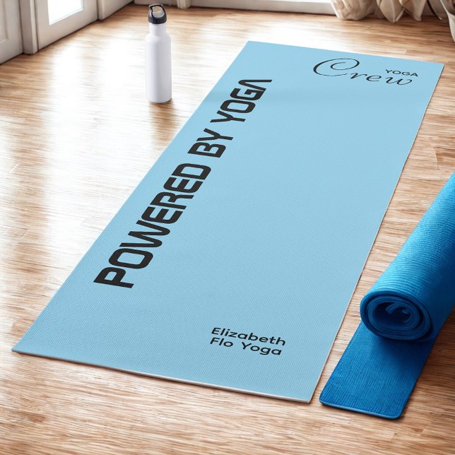 Esterilla De Yoga Custom Print Yoga Crew Baby Blue (Baby blue yoga mat on studio floor.)