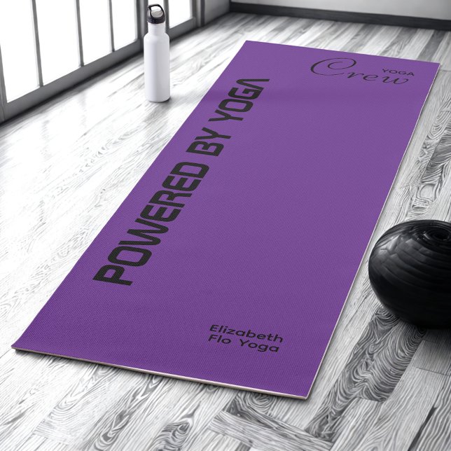 Esterilla De Yoga Custom Print Yoga Crew Royal Purple (Royal purple yoga mat on a studio floor.)