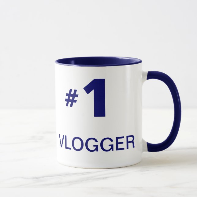 Estilo (zurdo) 2 de la taza de #1 Vlogger (Derecha)