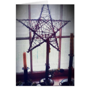 Estrella de arte folclórico y velas por vida