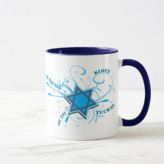 Estrella de David y taza frescas del azul de las
