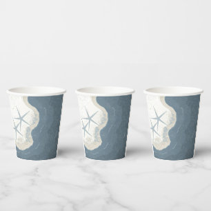 Estrellas de mar y vasos de papel de océano