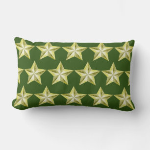 Estrellas de oro sobre almohada lumbar verde