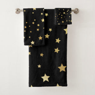 Estrellas del oro en fondo negro