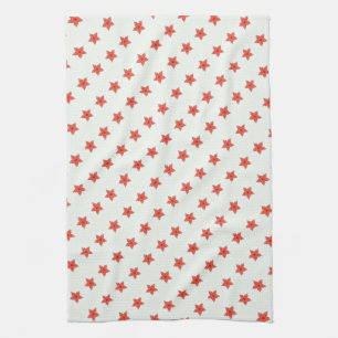 estrellas rojas en toalla blanca