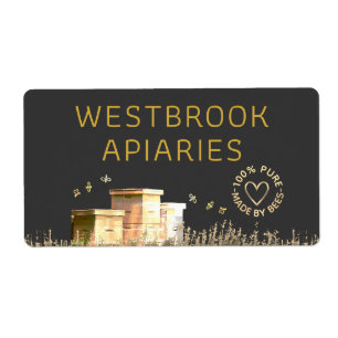 Etiqueta aérea de colmenas negras con corazón dora