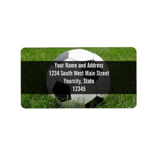 Etiqueta Balón de fútbol en hierba