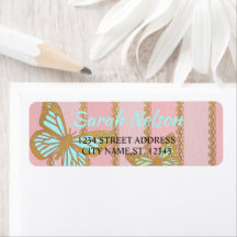 Bandas de oro rosadas y mariposa