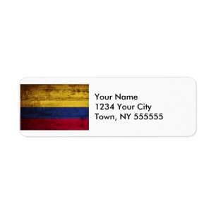 Etiqueta Bandera de Colombia en antigua textura de madera