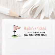 Bandera y pelota de golf del corazón rosado