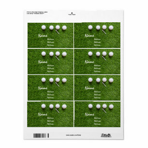 Etiqueta Bolas de golf y tee sobre césped verde