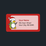 Etiqueta Christmas penguin walking on snow<br><div class="desc">A little penguin cartoon with santa hat and green scarf walking on snow.</div>