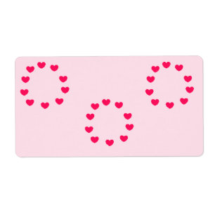 Etiqueta círculos cardíacos rojos en rosa