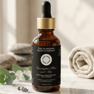Etiqueta de botella de cosméticos negra con logoti