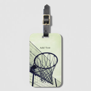 Etiqueta de equipaje gris de baloncesto