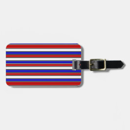 Etiqueta de equipaje rojo, blanco y azul