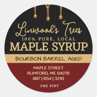 Etiqueta de jarabe de arce con goteo en negro y ro