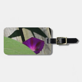 Etiqueta de mano del equipaje con las flores