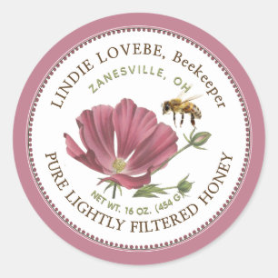 Etiqueta de miel de flores con flor rosa y abeja
