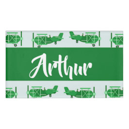 Etiqueta De Nombre Aviones voladores verdes sobre azul