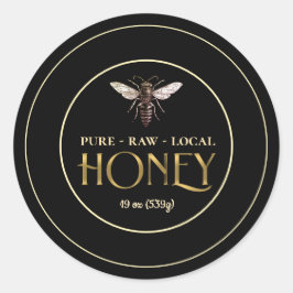 Etiqueta de oro y miel negra con abeja reina vinta