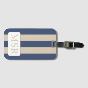 Etiqueta de portaequipajes con franjas moradas y d