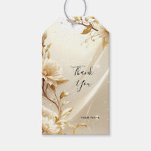 Etiqueta de regalo de flores blancas y doradas