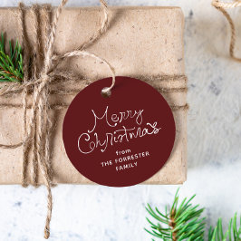 Etiqueta de regalo de Navidad con letra caprichosa