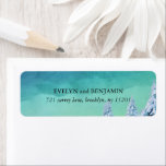 Etiqueta Elegant Blue Watercolor Winter Return Address<br><div class="desc">These gorgeous watercolor return address labels,  designed to match our Magical Winter wedding invitation and event stationery line,  feature snow-covered pine trees against a blue and green backdrop. In classic white writing,  your return address will be printed.</div>