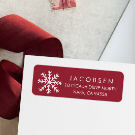 Etiqueta Festividad de copos de nieve rojos y blancos